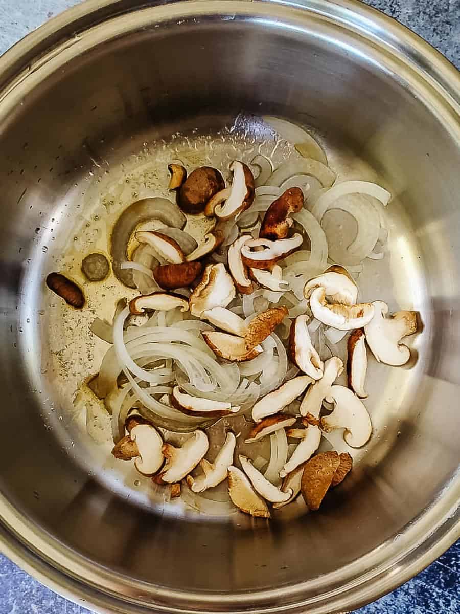 Sautรฉing Mushrooms and Onions.