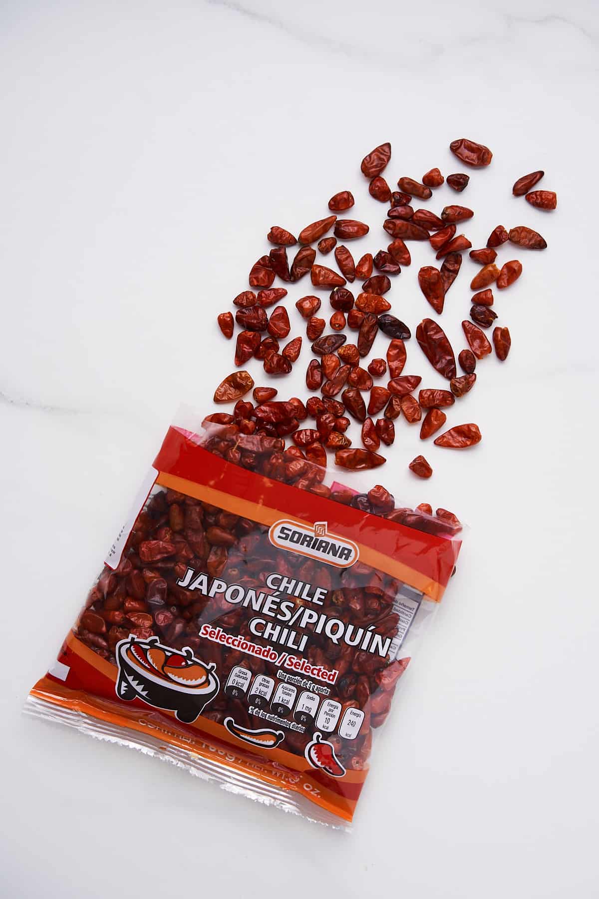 Piquin Chiles Coming Out of a Package.