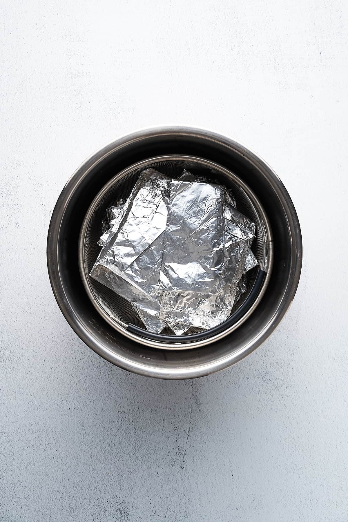 Wrapped seitan pieces in a steamer.