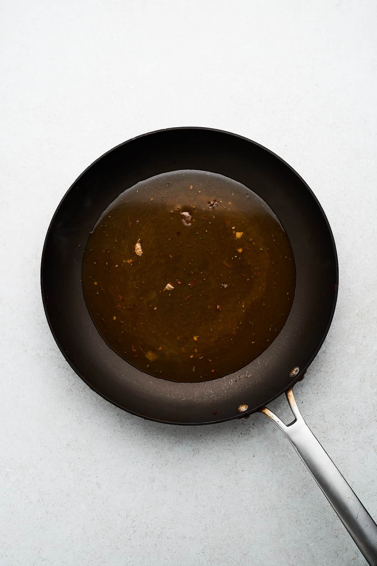 Vegetable broth in a pan.