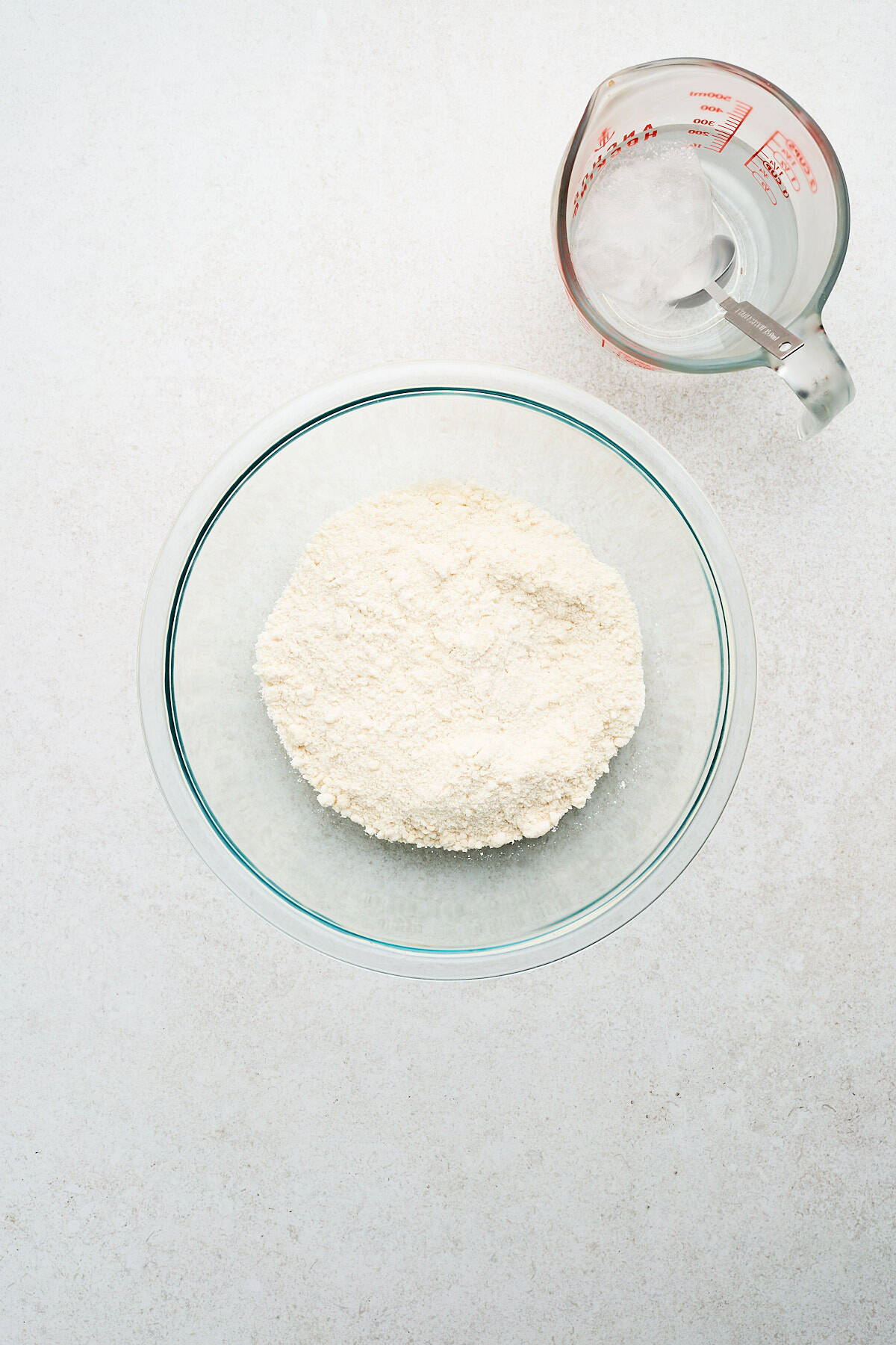 Ice water and pie dough mixture.
