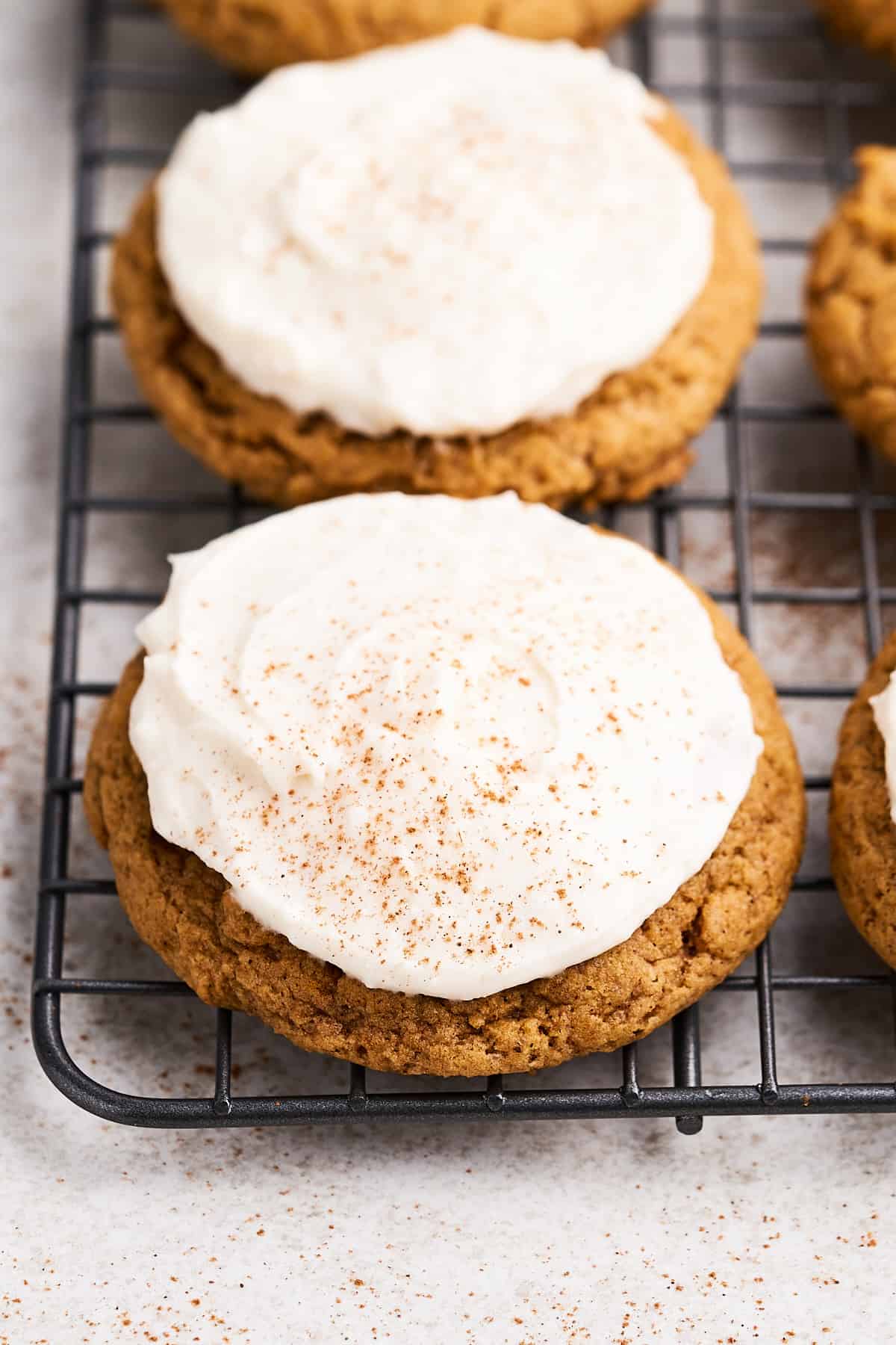 Vegan pumpkin cookies on a rack.