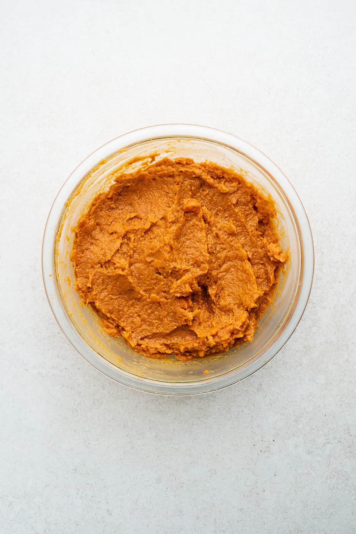 Mashed sweet potatoes in a bowl.