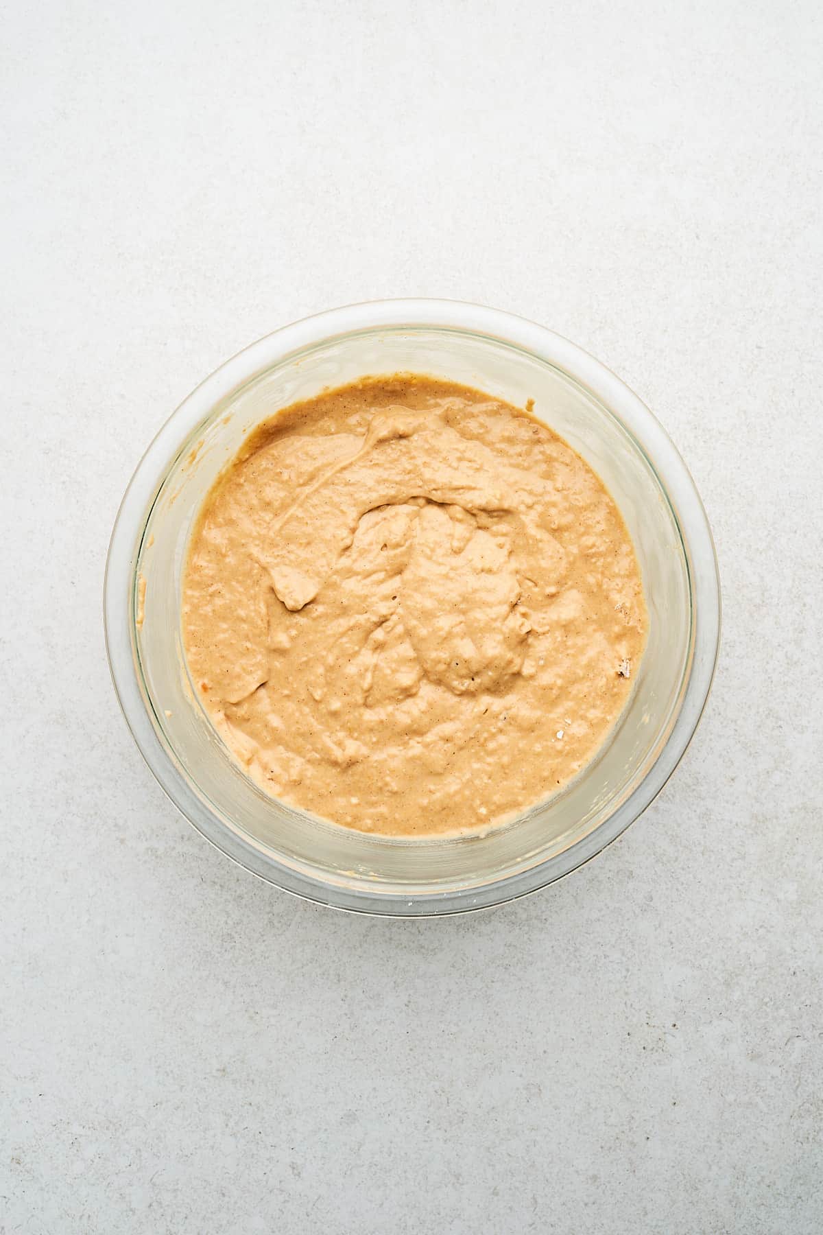 Vegan sweet potato pancake batter in a bowl.