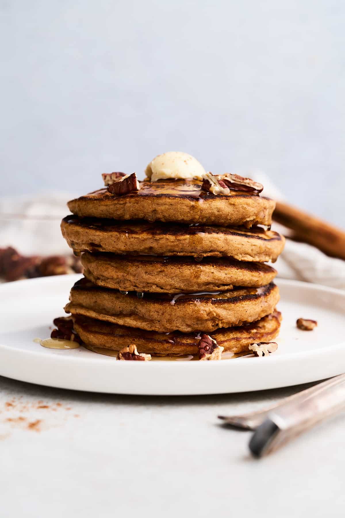 Vegan sweet potato pancakes on a plate.