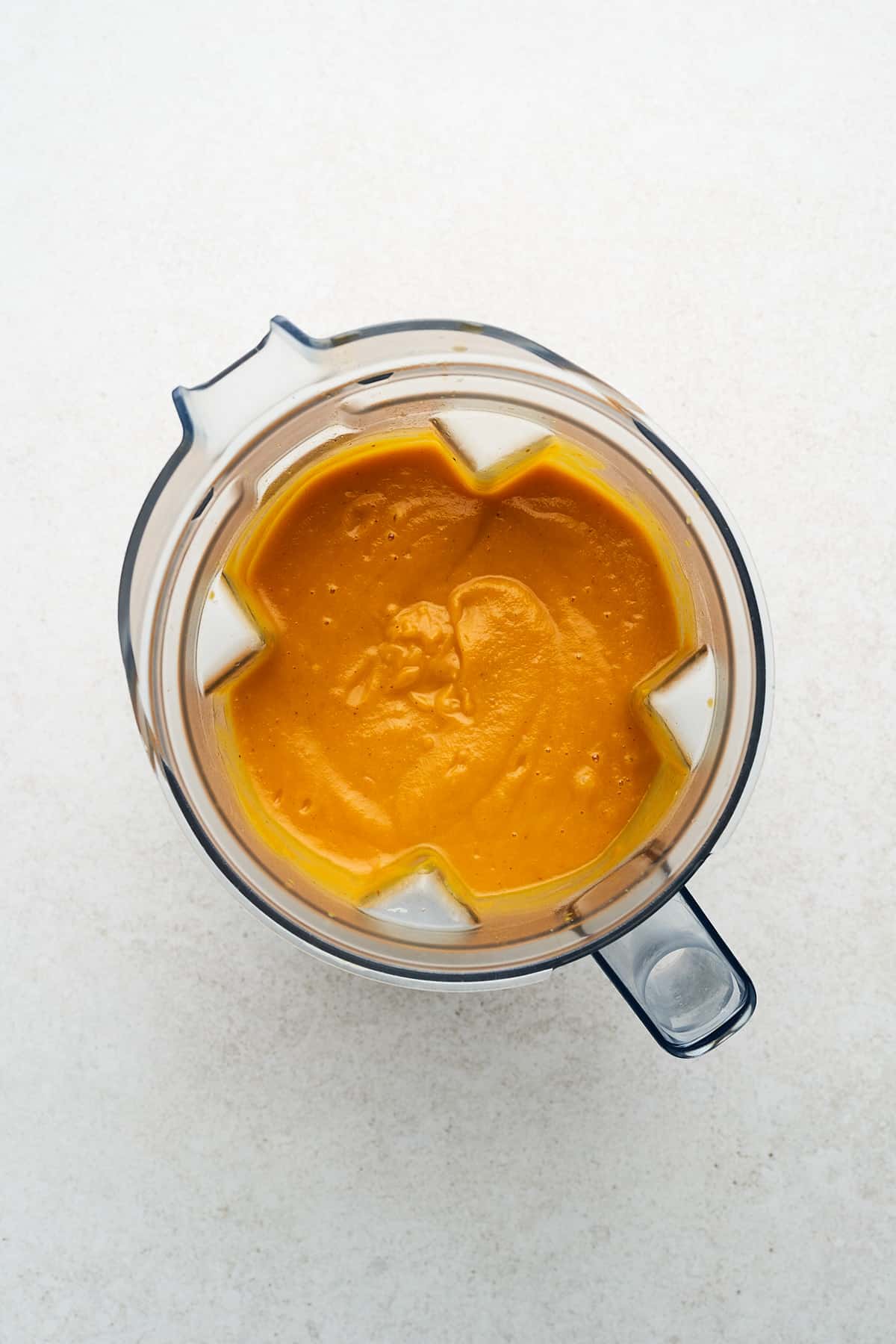 Vegan sweet potato soup in a pot.