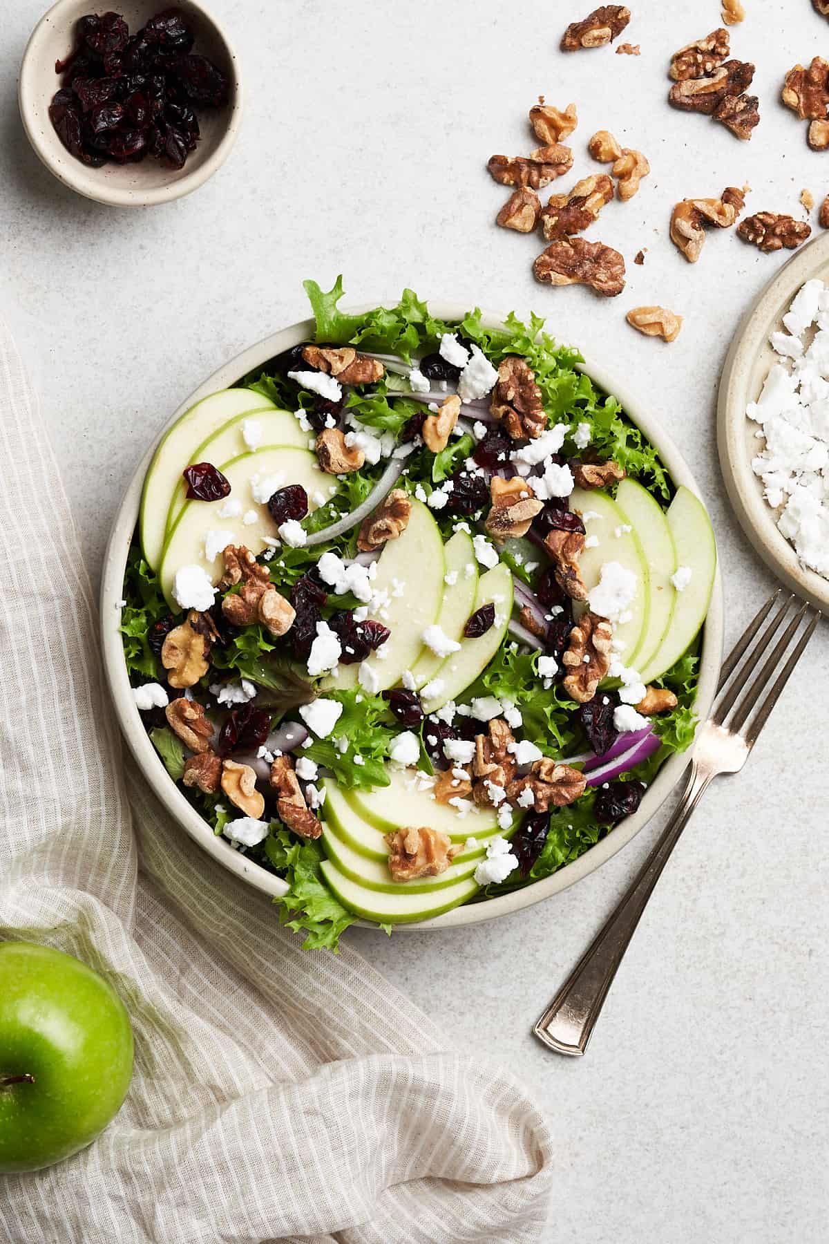 Apple walnut salad in a bowl.