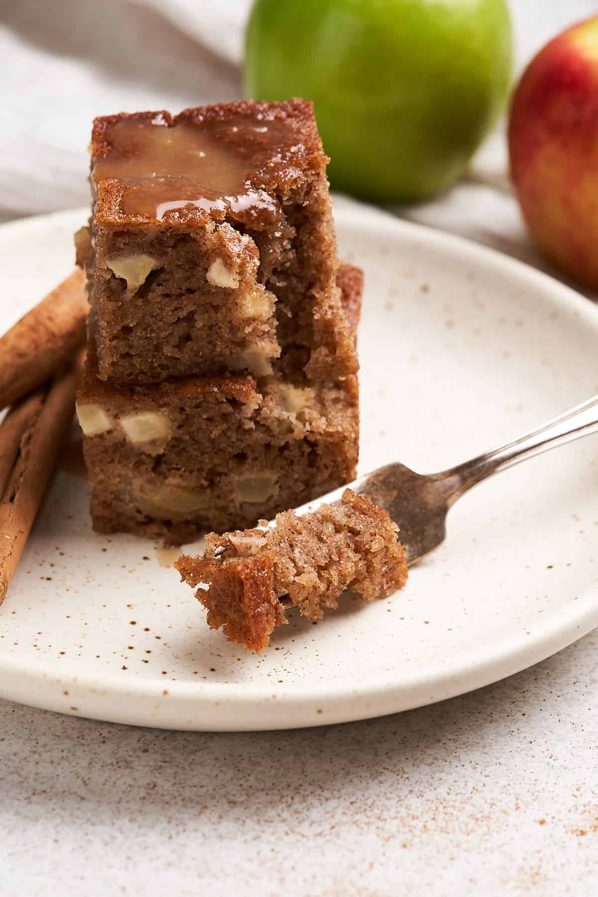 Forkful of vegan apple cake.