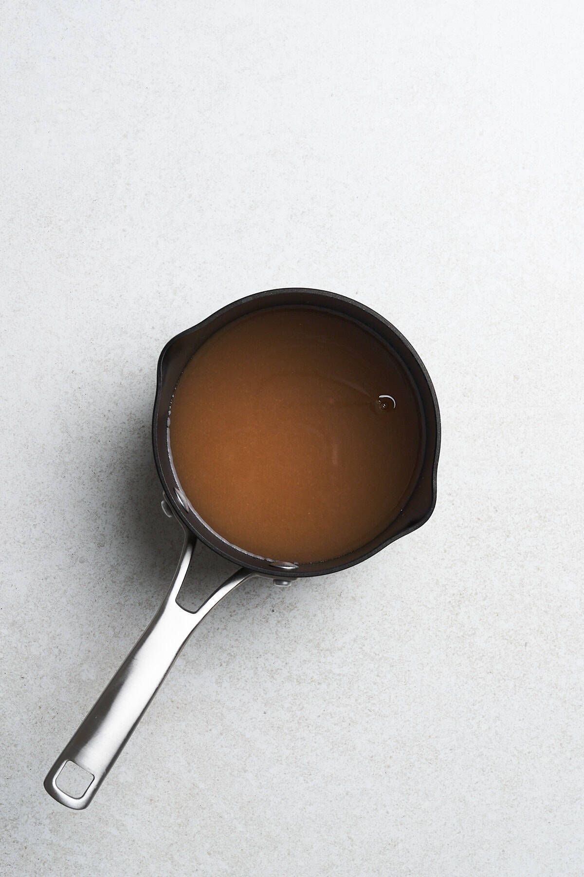 Apple cider in a saucepan.