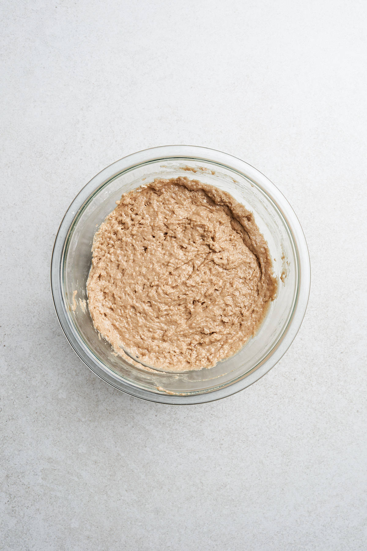 Batter for vegan apple cider donuts in a bowl.