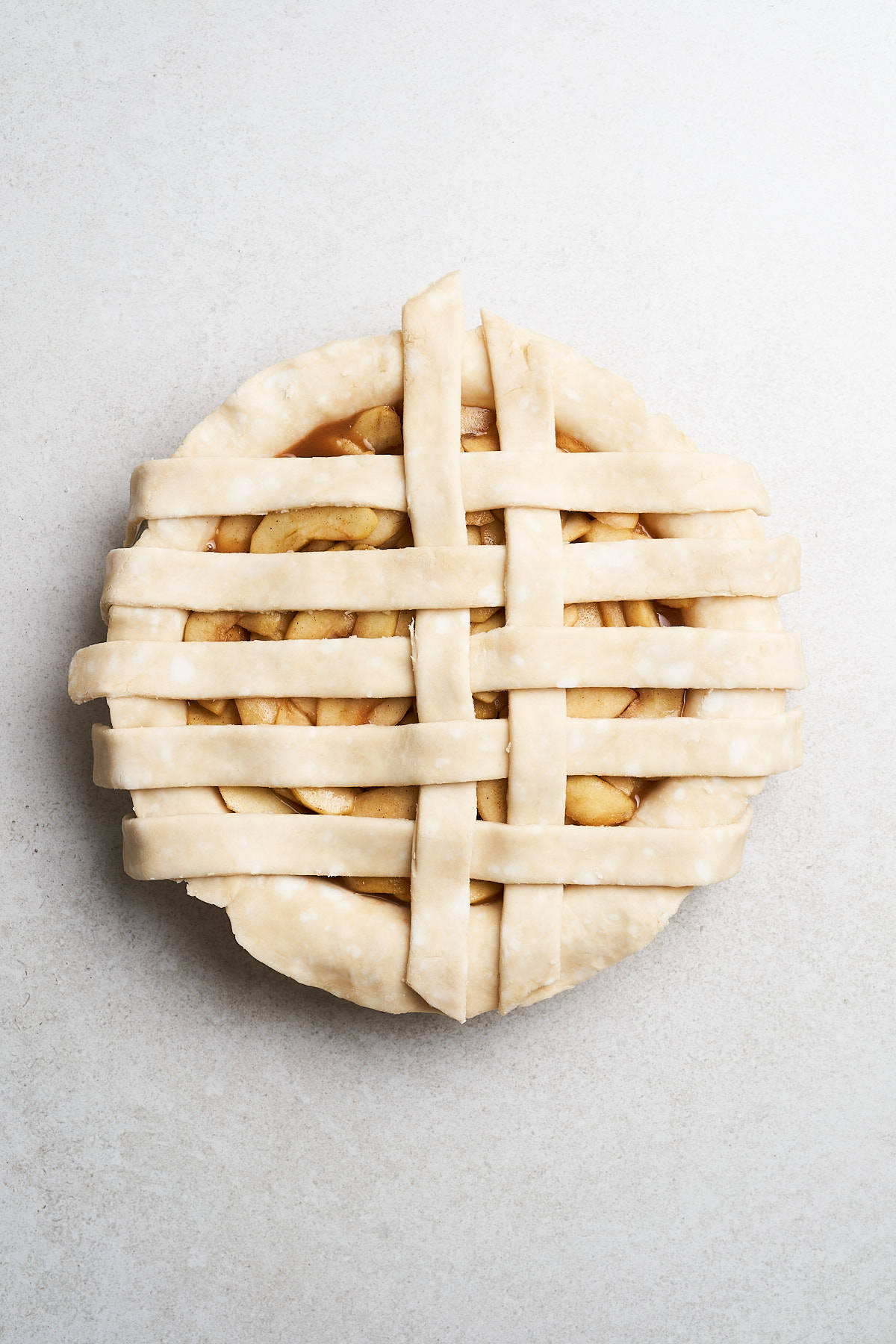 Latticing a pie crust.
