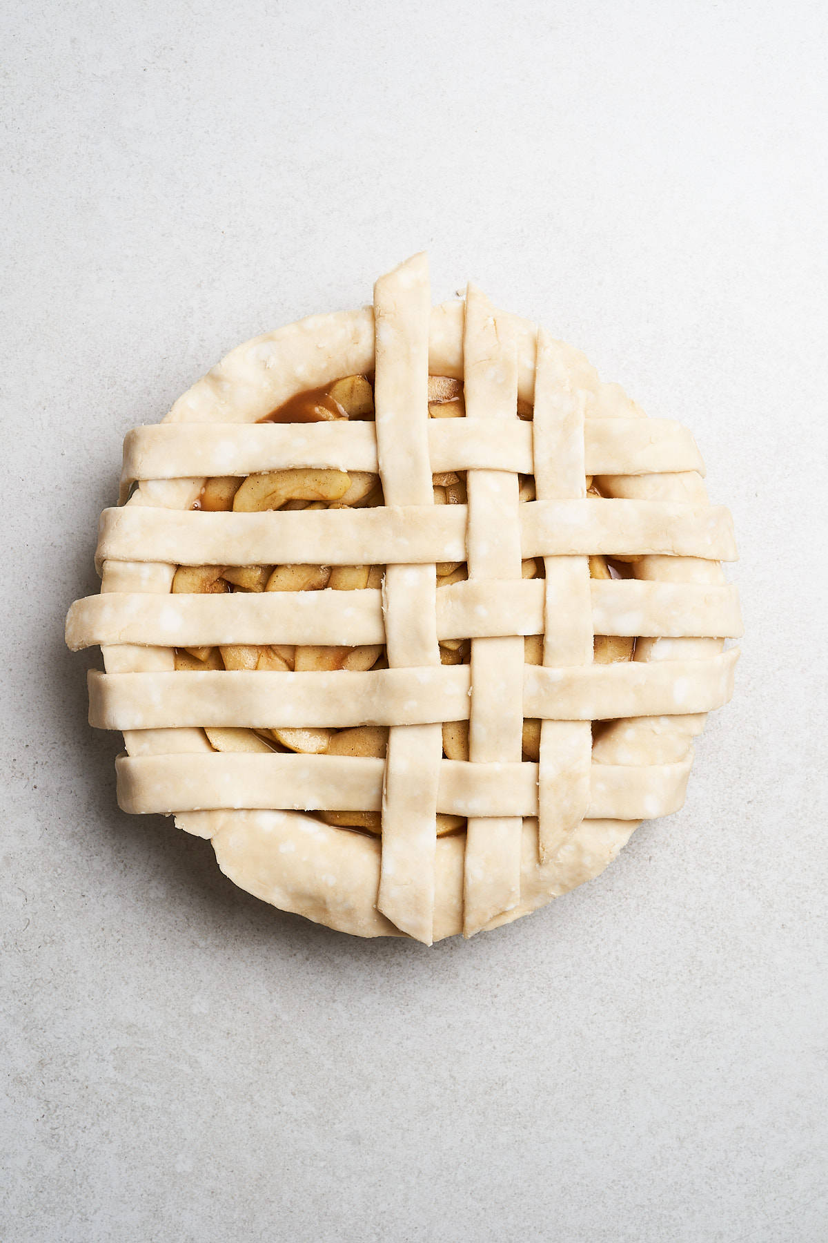 Latticing a pie crust.