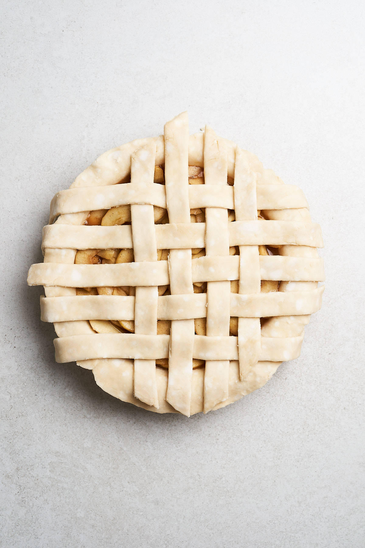 Latticing a pie crust.