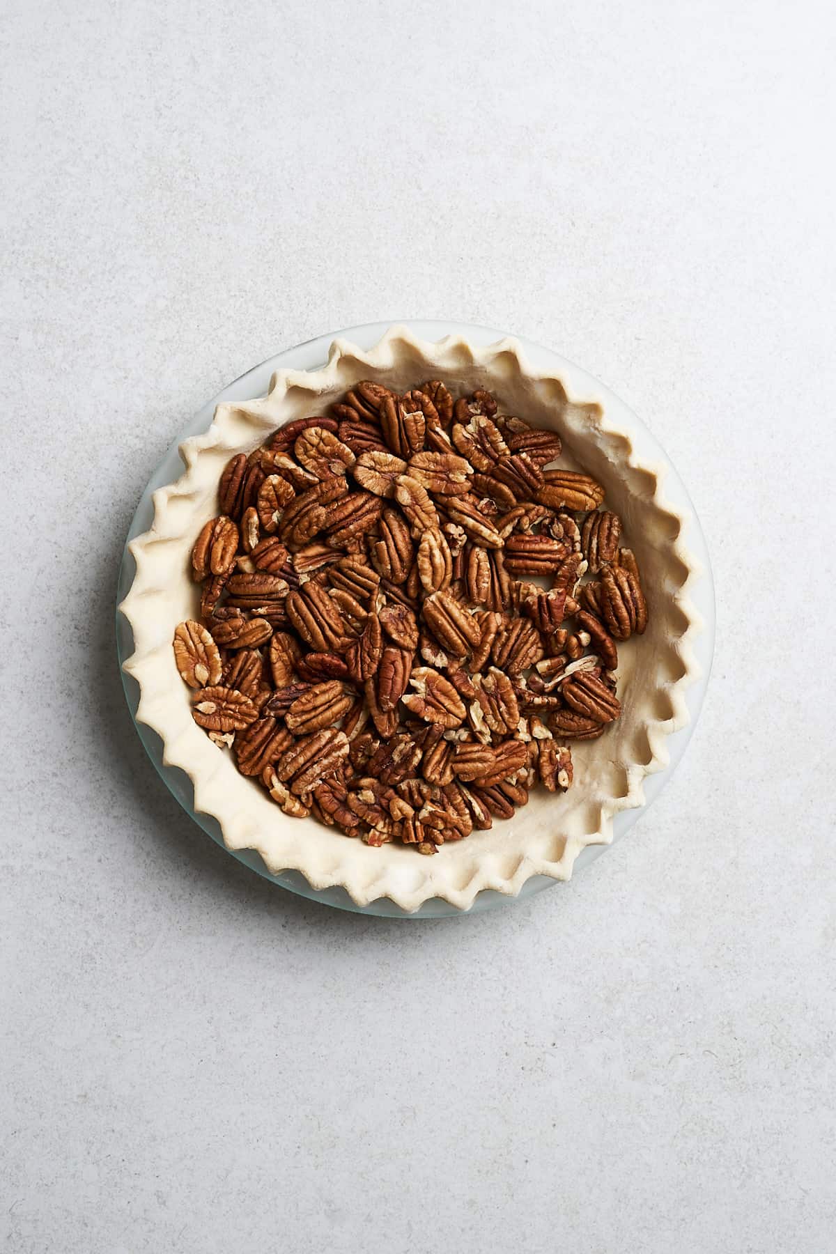 Pecans in a frozen pie crust.