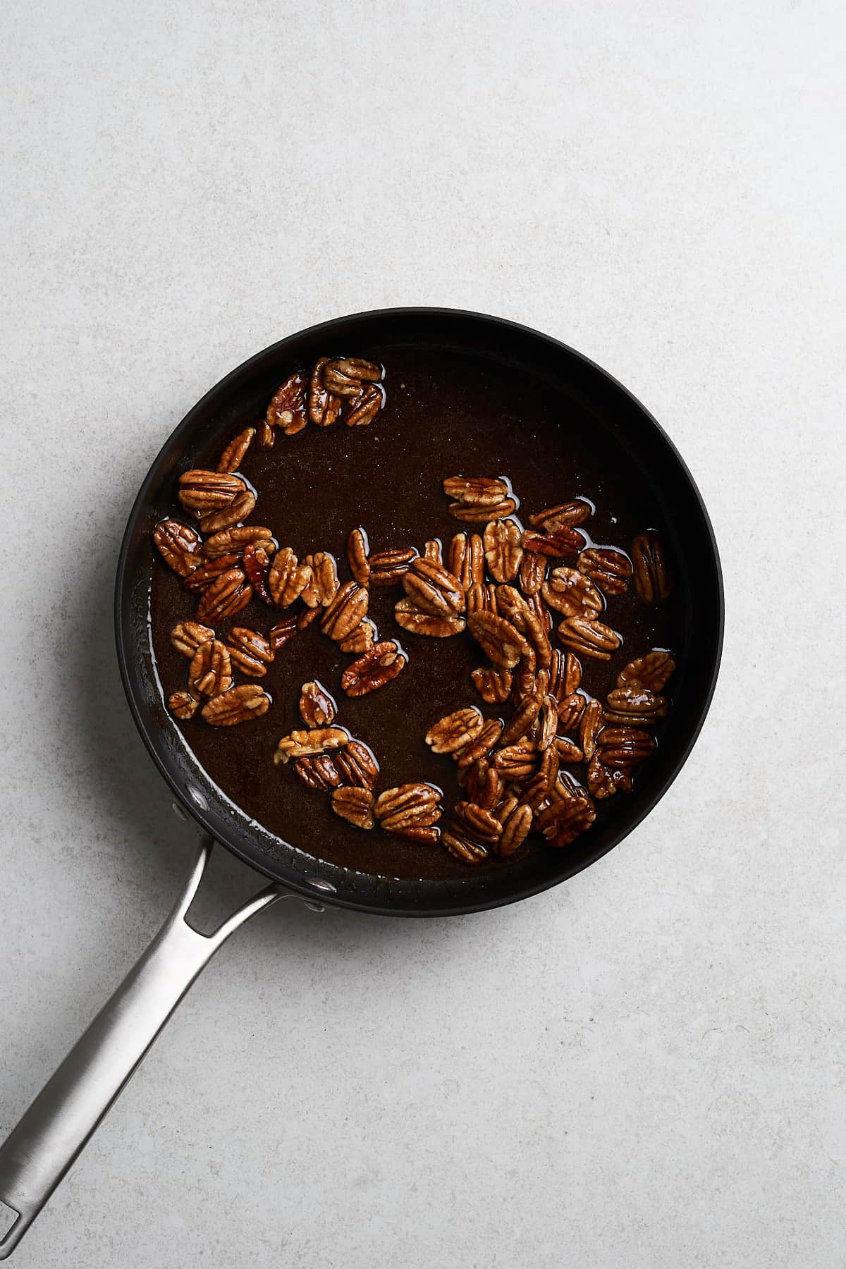 Pecans in brown sugar syrup.