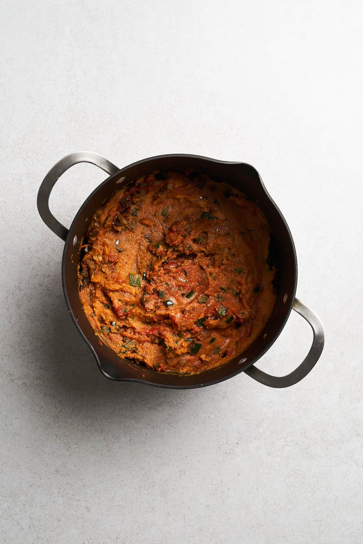 Pumpkin purée, tomato paste, and aromatics.