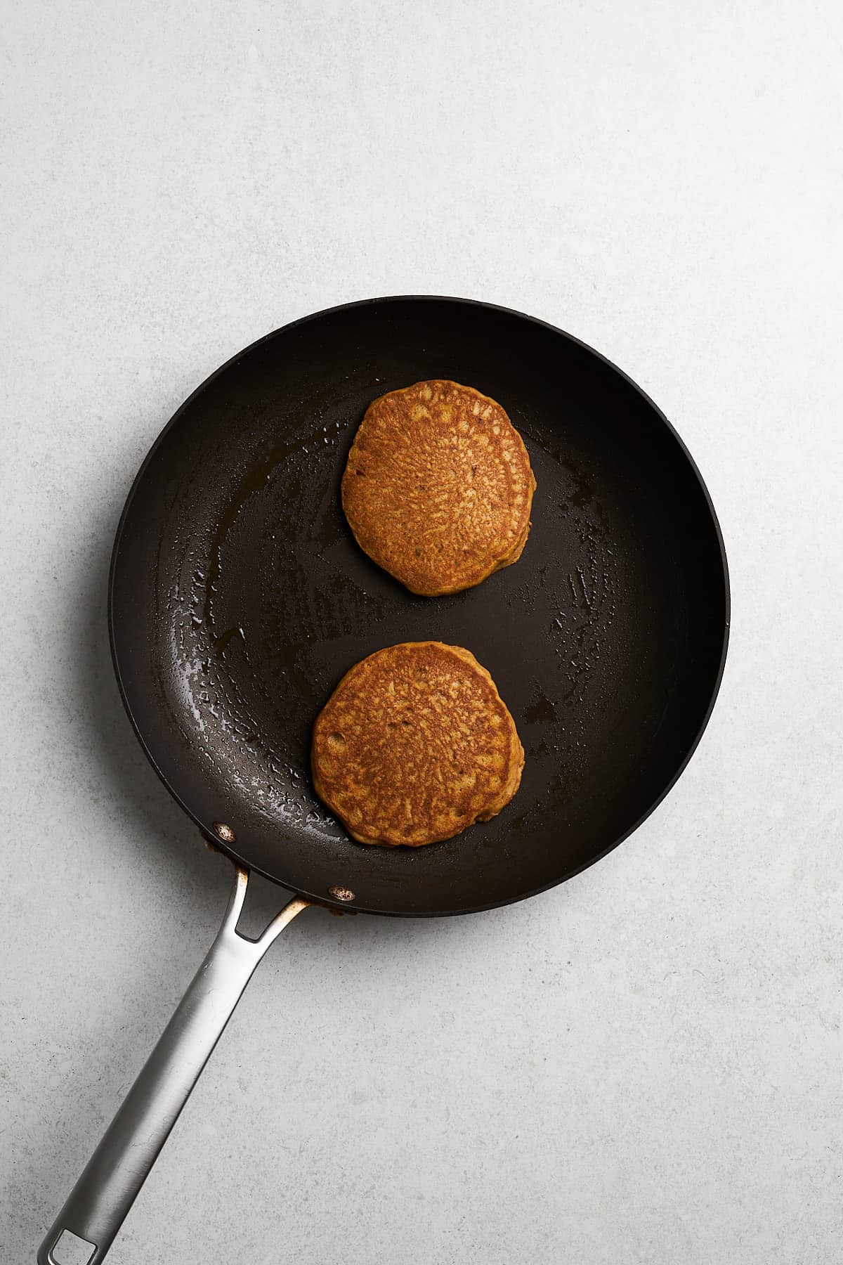 Half cooked pumpkin pancakes.