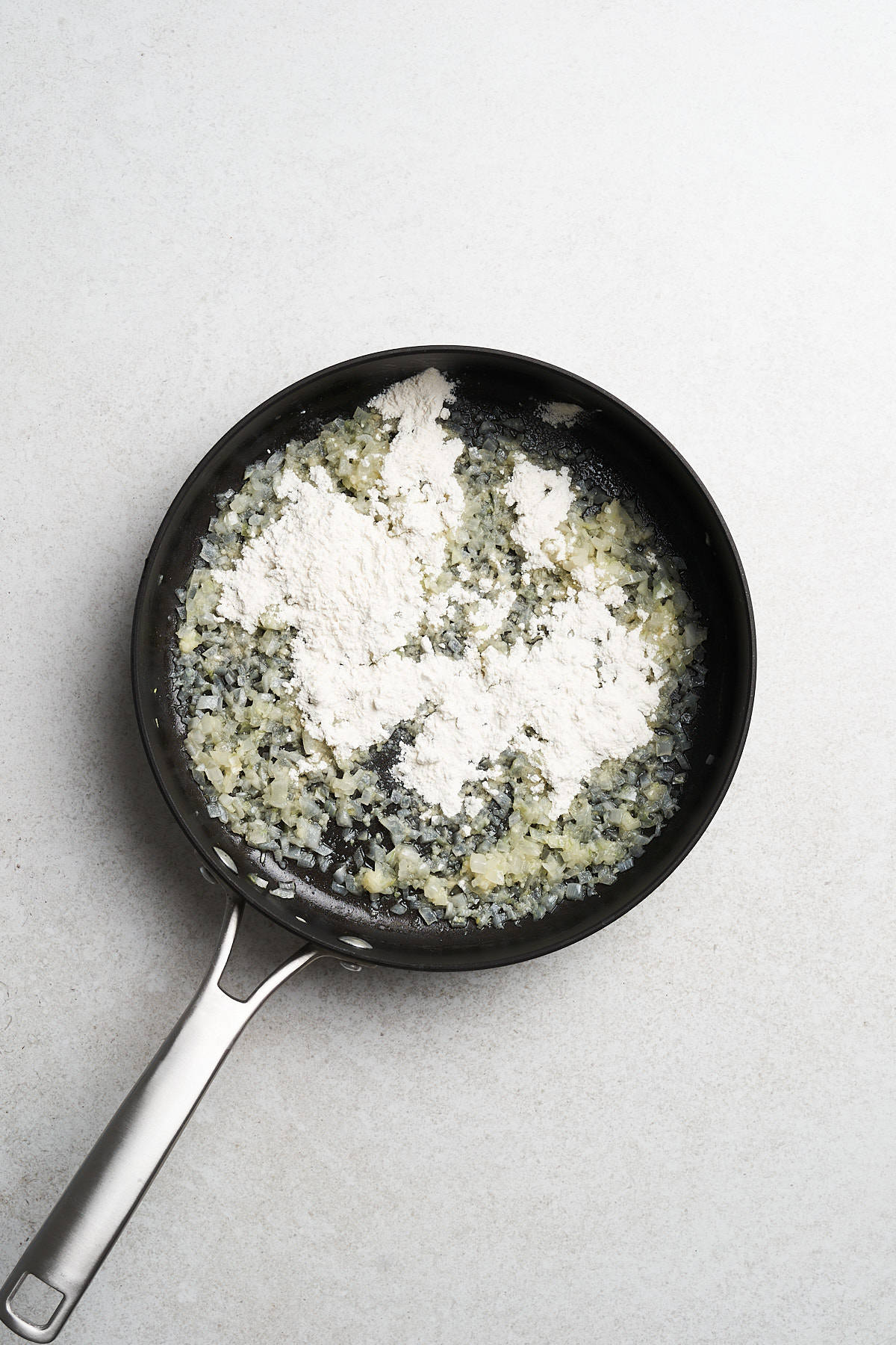 Flour, onion, and garlic in vegan butter.