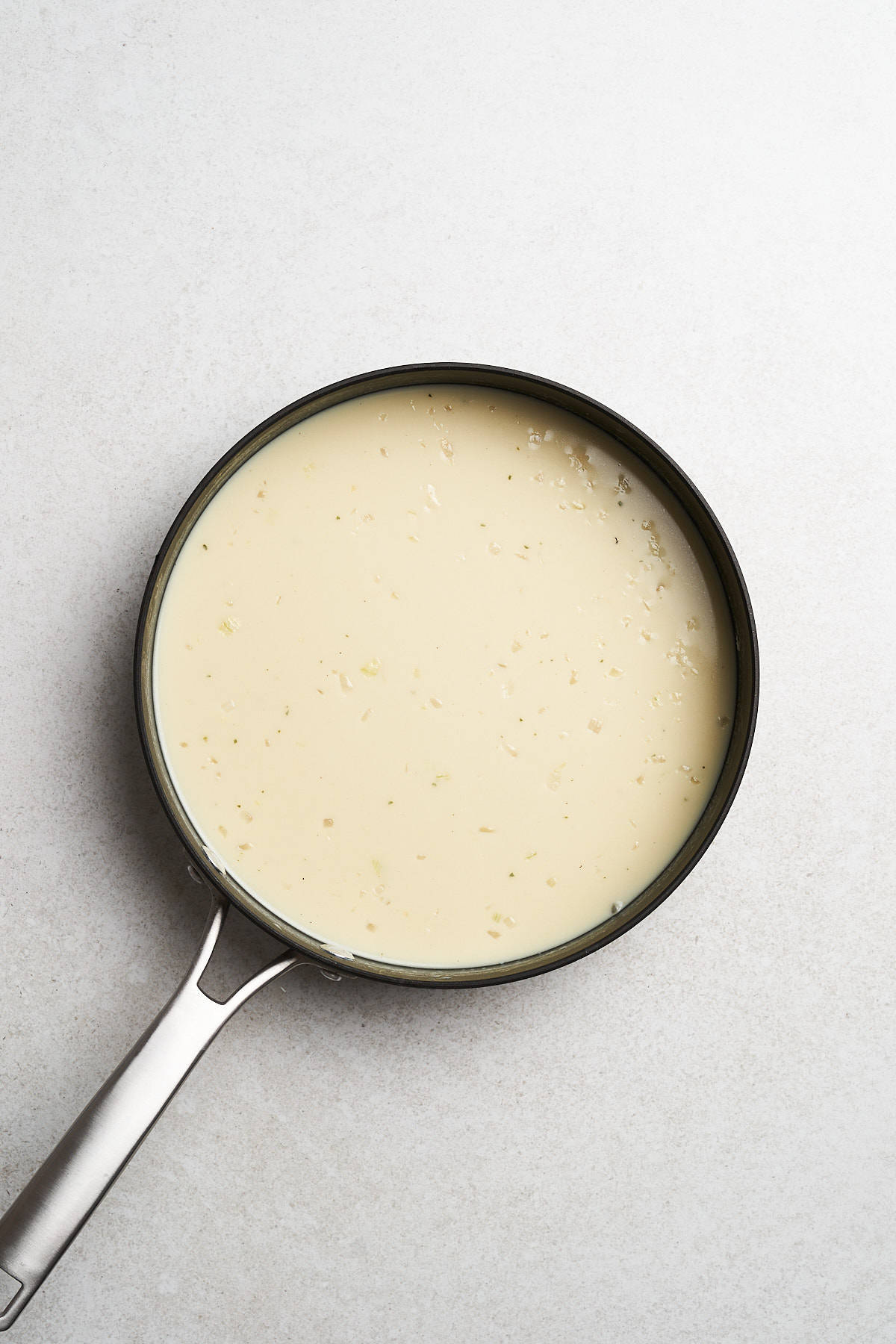 White sauce with garlic and onion.