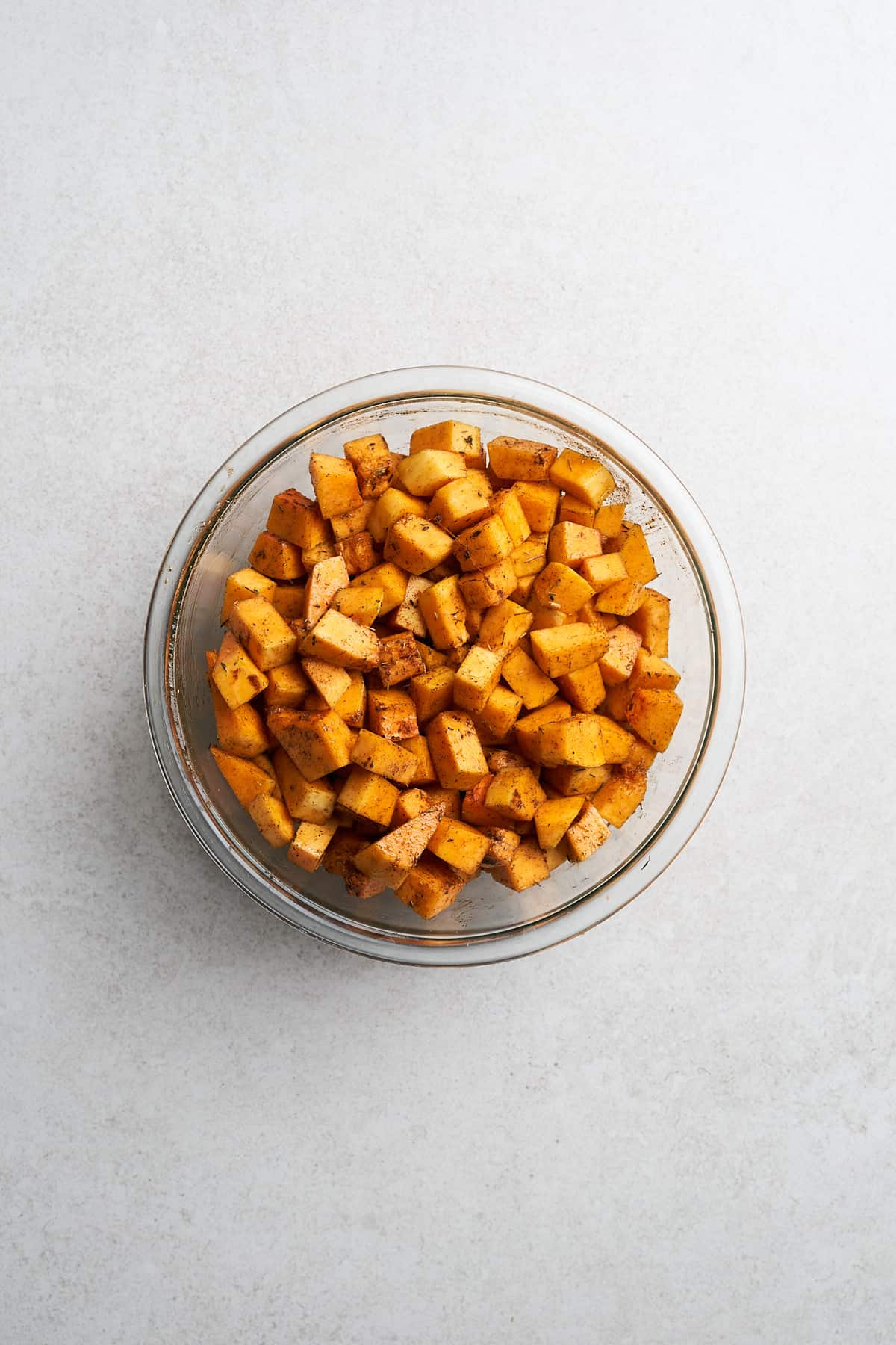 Air fryer butternut squash in a bowl.