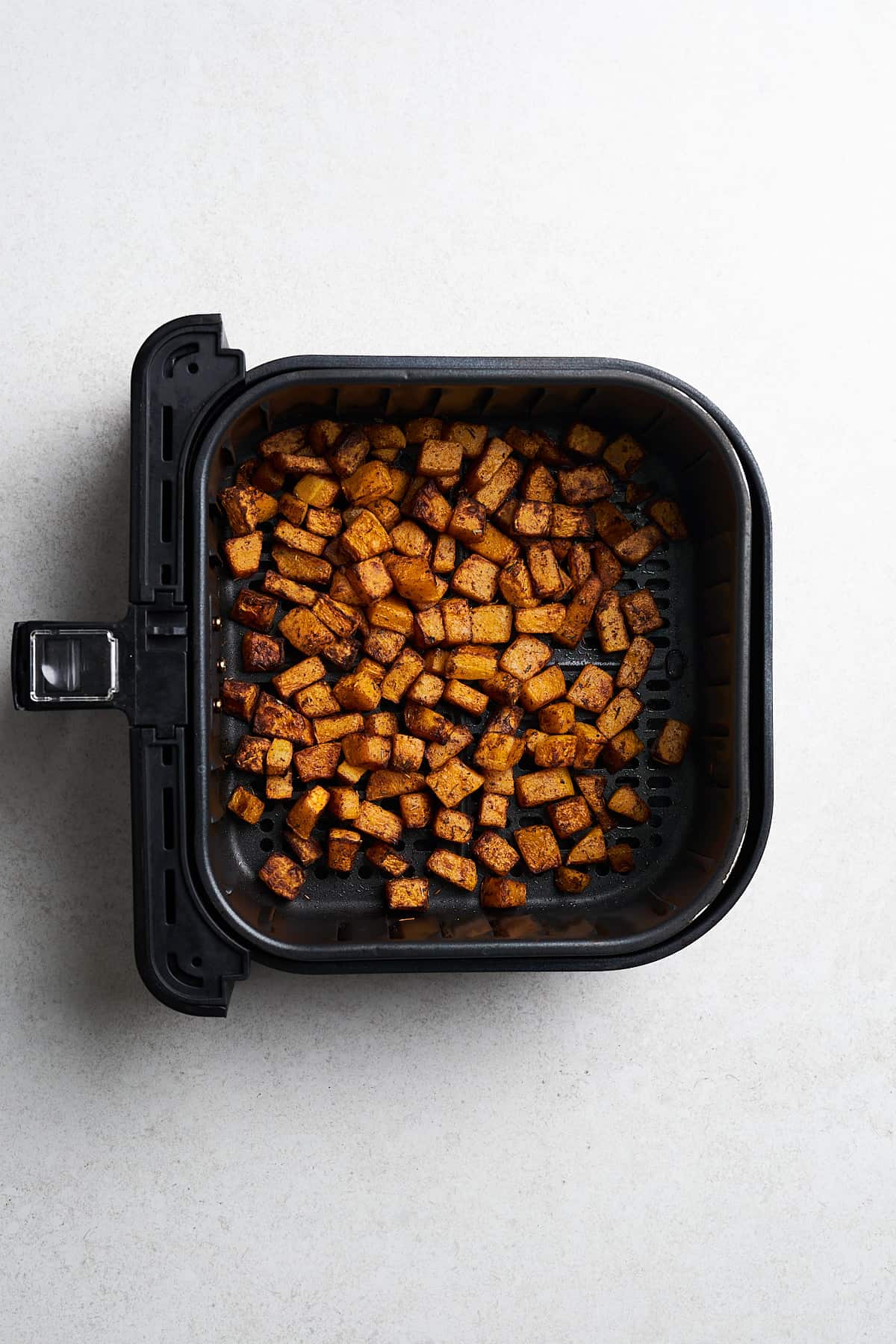 Cooked butternut squash in the air fryer.