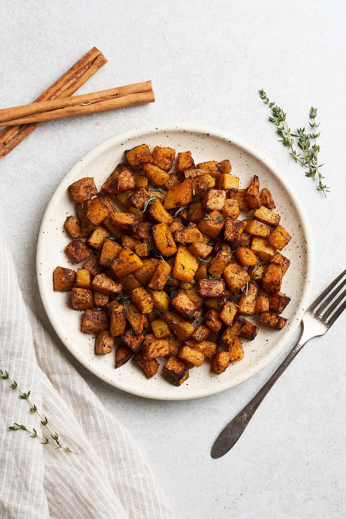 Air fryer butternut squash on a plate.