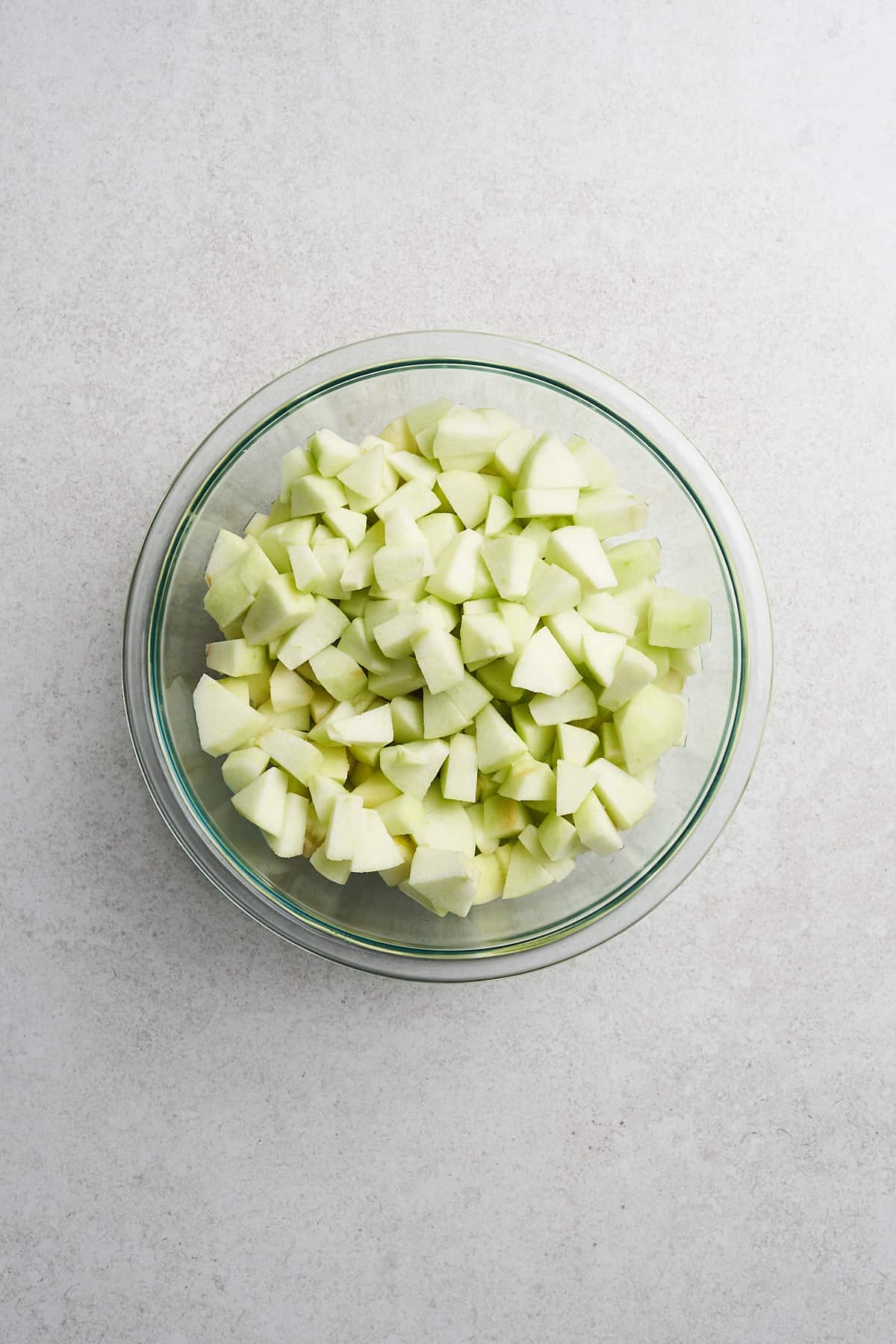 Vegan Apple Crumble in a measuring cup.