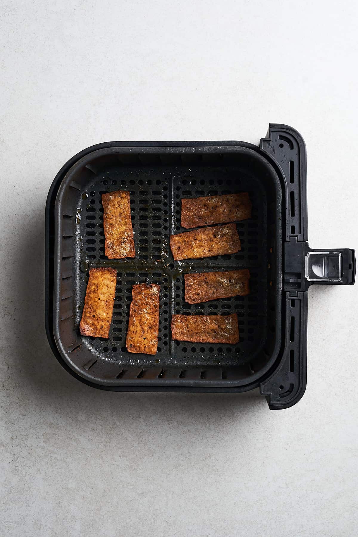 Crispy tofu in an air fryer.