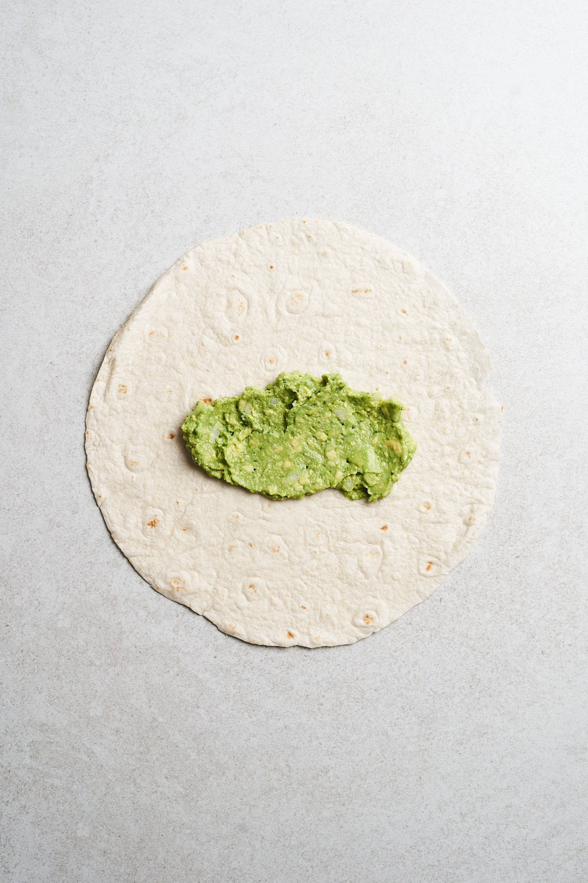 Guacamole in a tortilla.