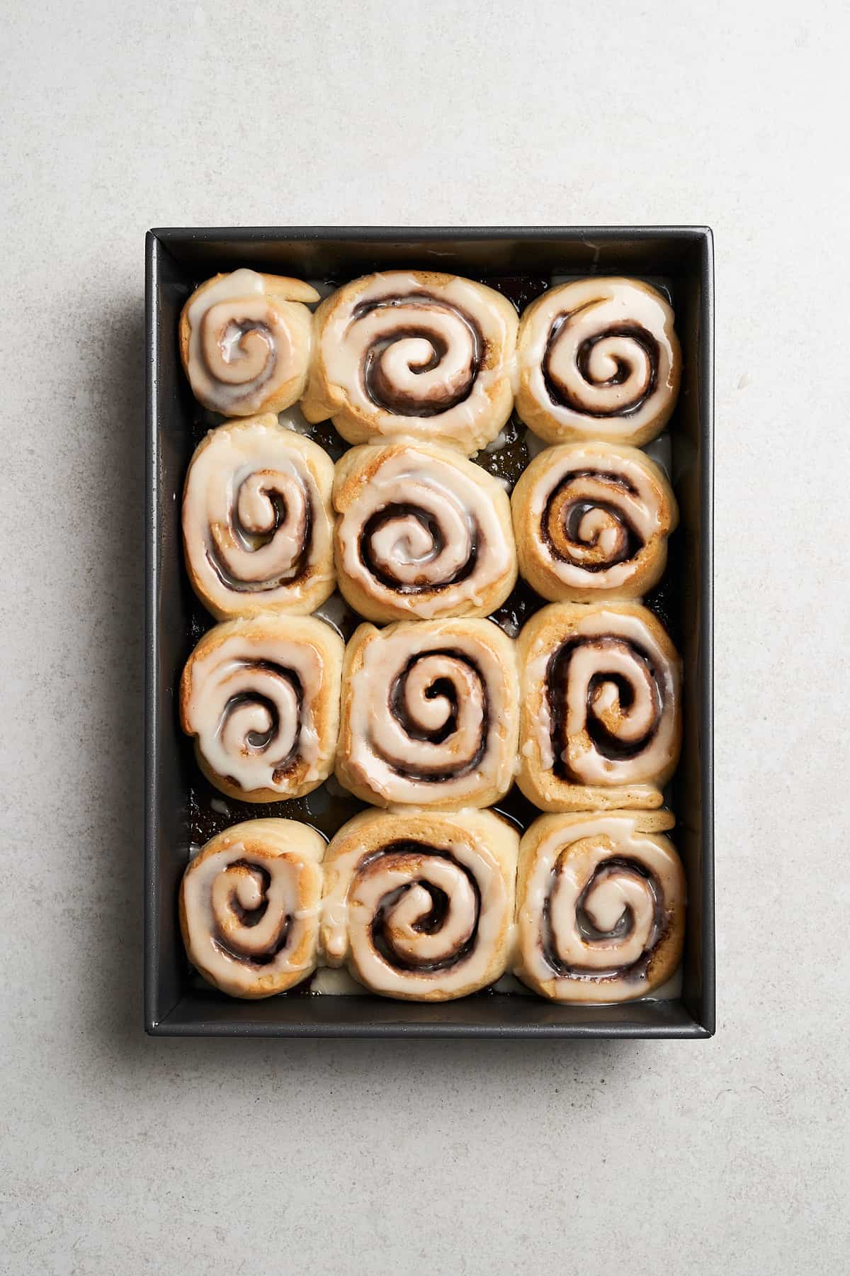 Vegan Cinnamon Rolls and baking sheet.