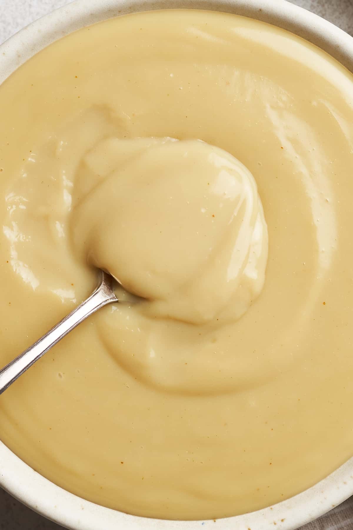 Spoonful of vegan custard.