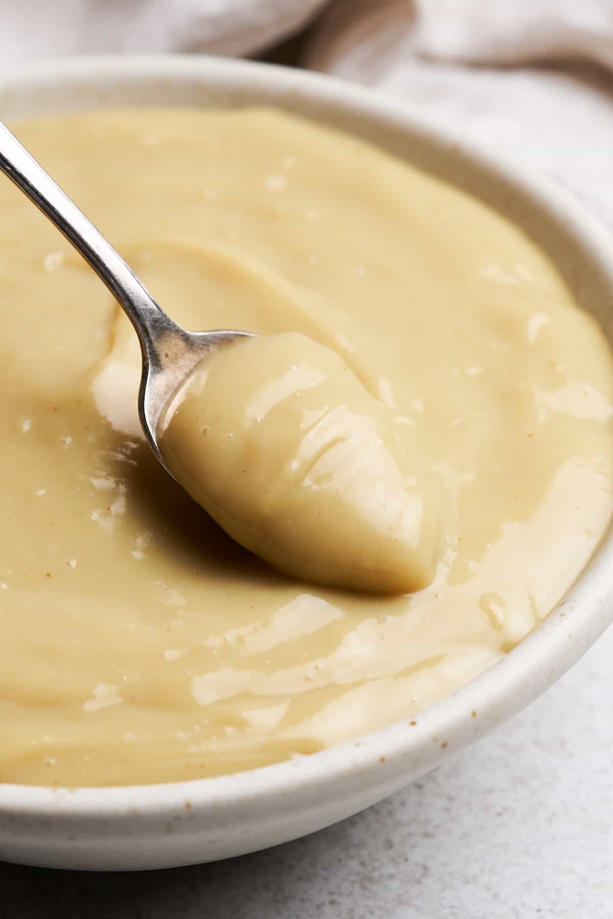 Spoonful of vegan custard.