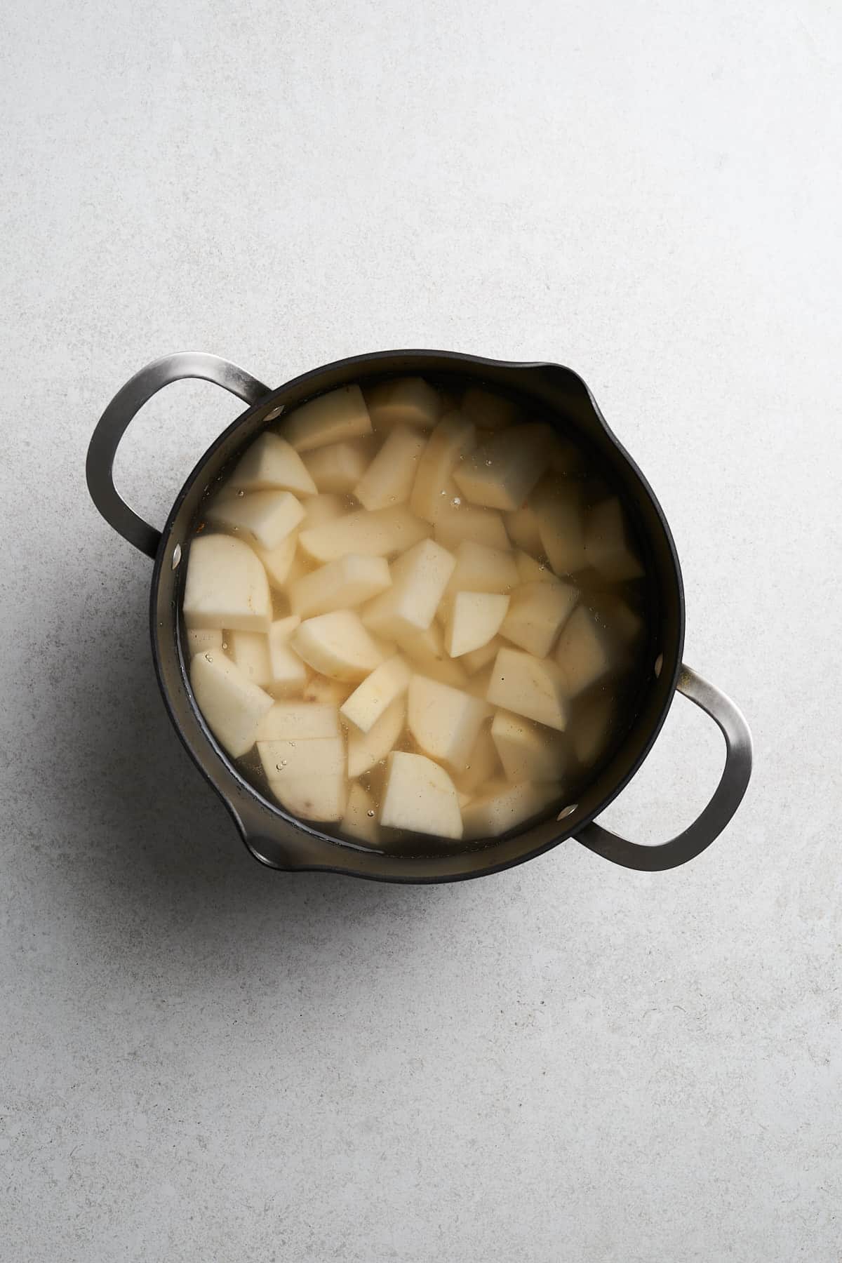 Vegan Mashed Potatoes in a saucepan.