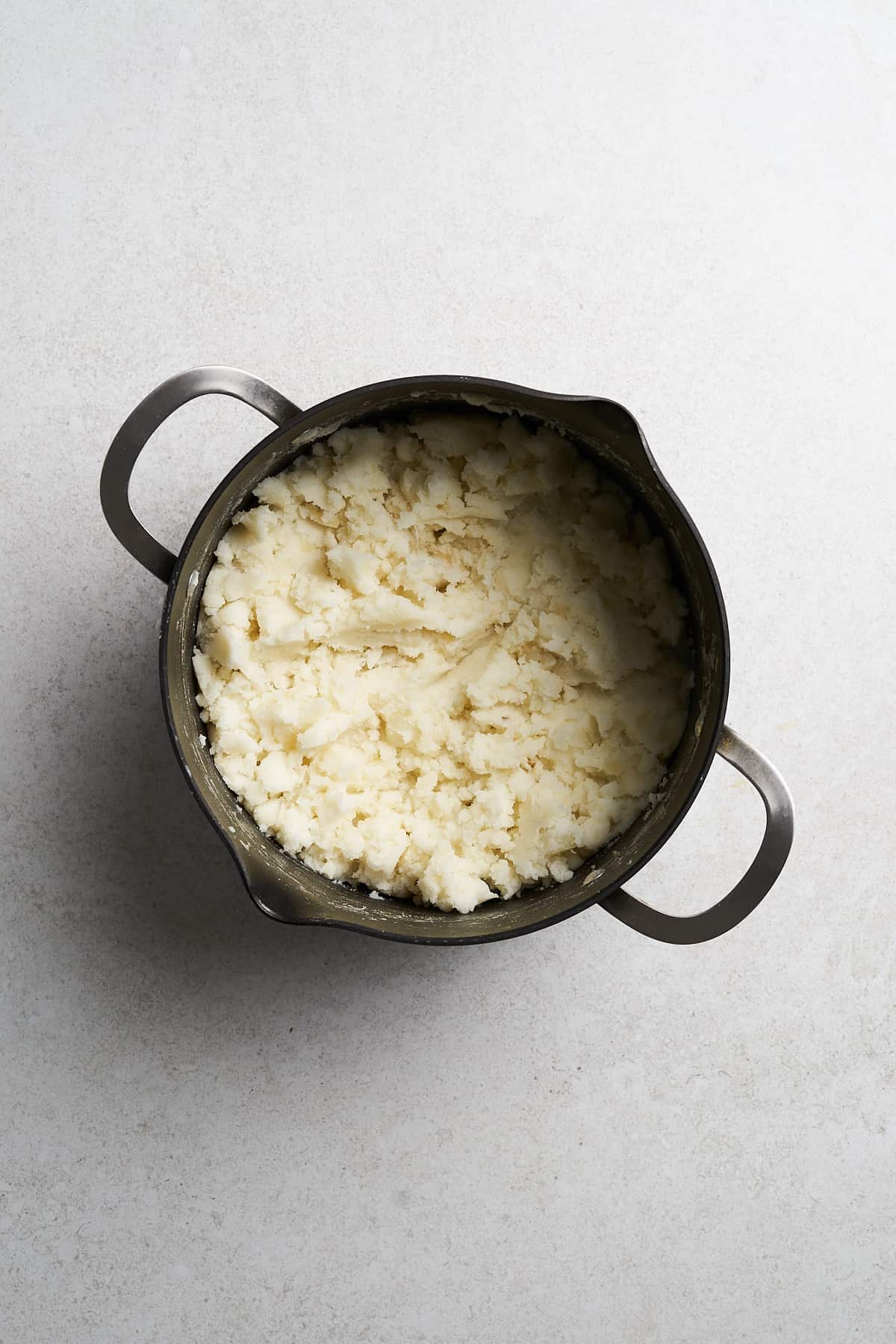 Vegan Mashed Potatoes in a saucepan.