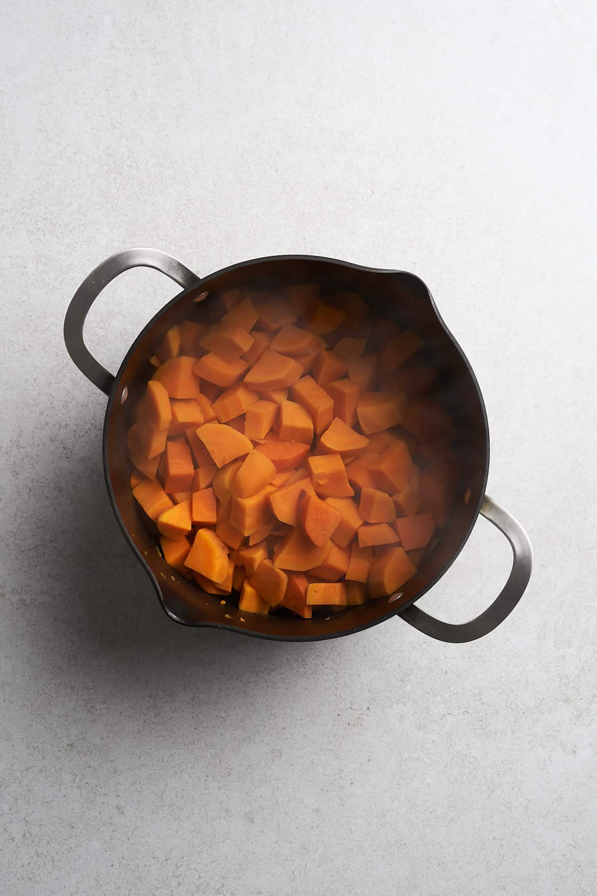 Vegan Mashed Sweet Potatoes in a saucepan.