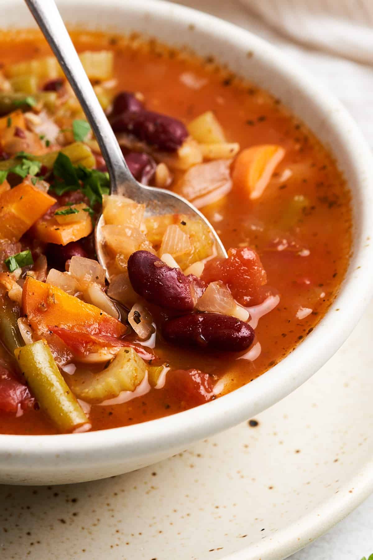 Spoonful of vegan minestrone soup.