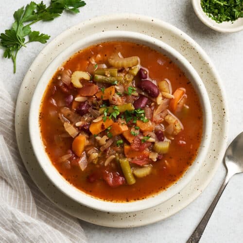 Vegan minestrone soup on a plate.