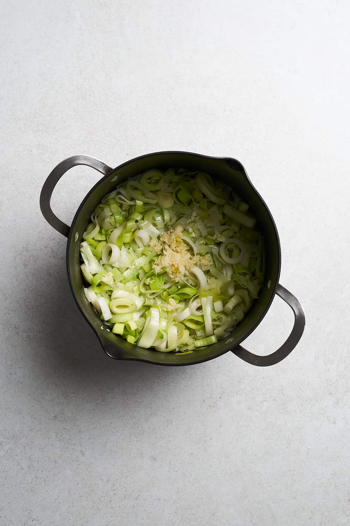 Leeks and garlic in a pot.