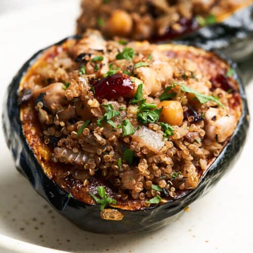 Vegan stuffed acorn squash on a plate.
