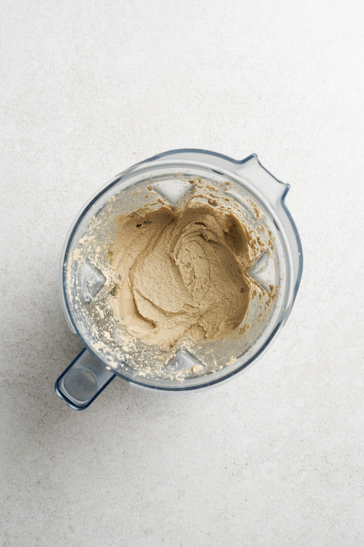 Drained soaked sunflower seeds in a blender.