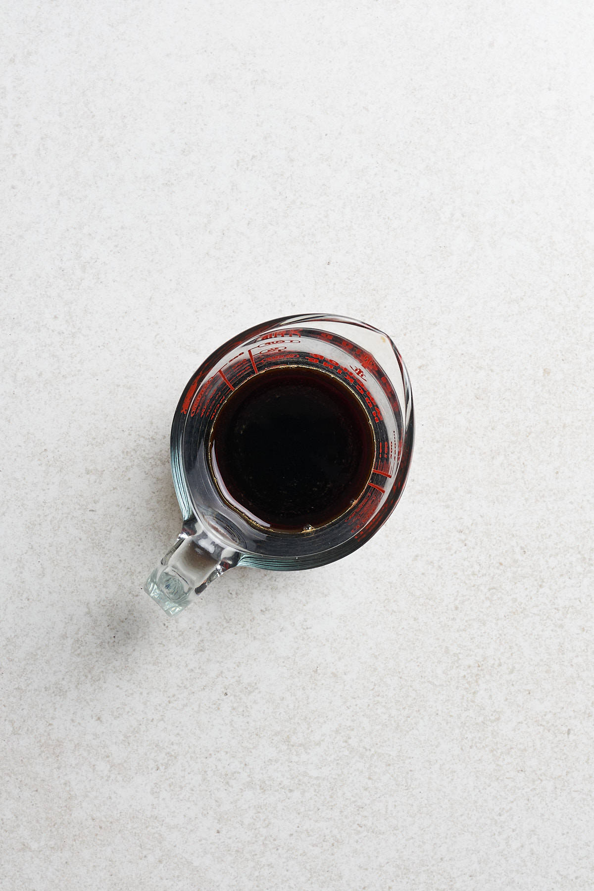 Soy sauce in a measuring cup.
