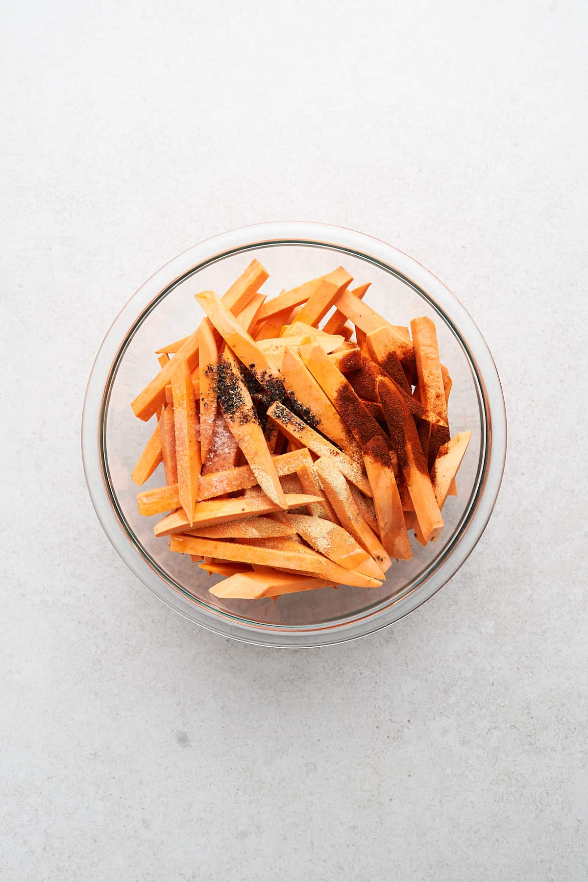 Sweet potatoes with spices in a bowl.