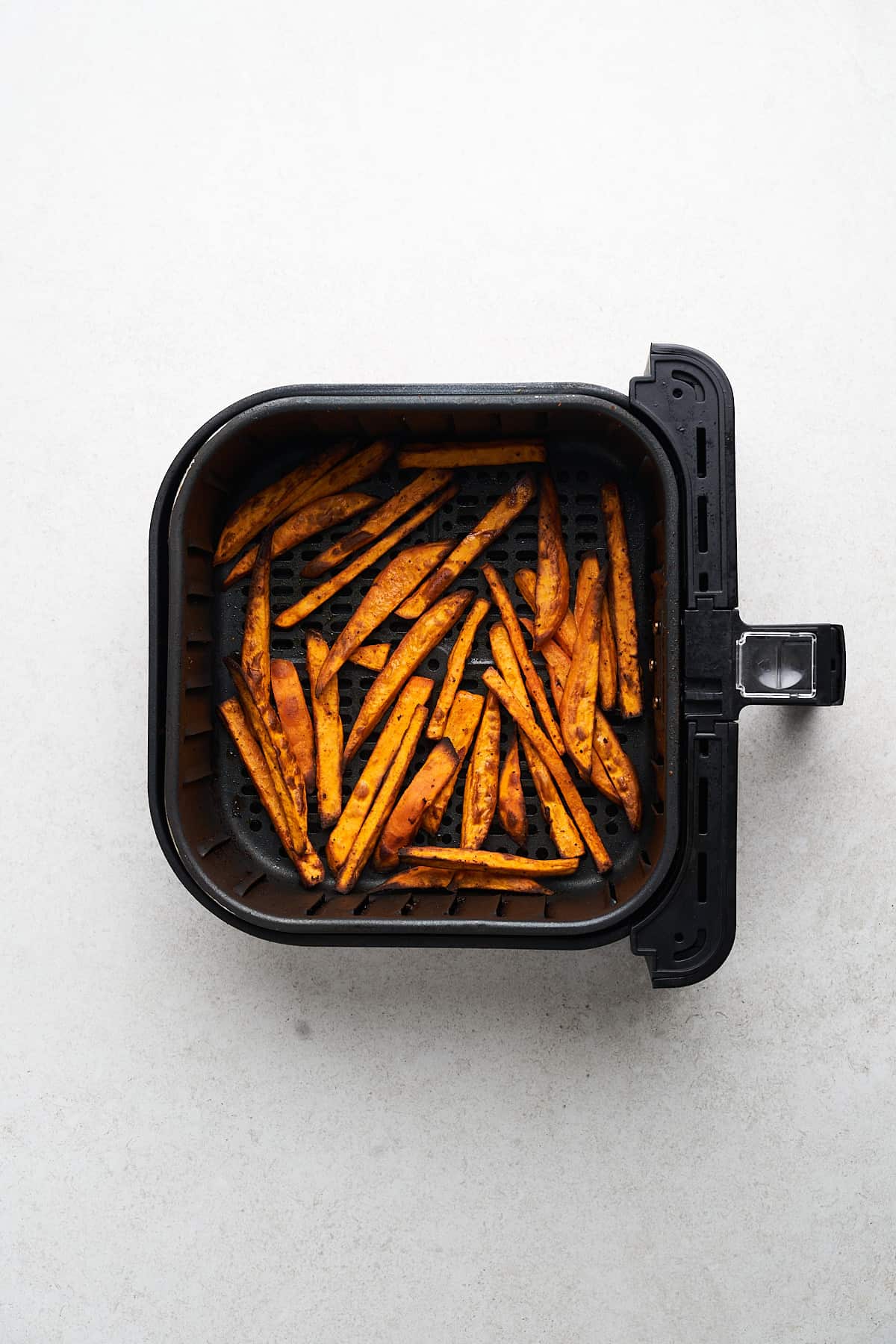 Cooked sweet potatoes in an air fryer.