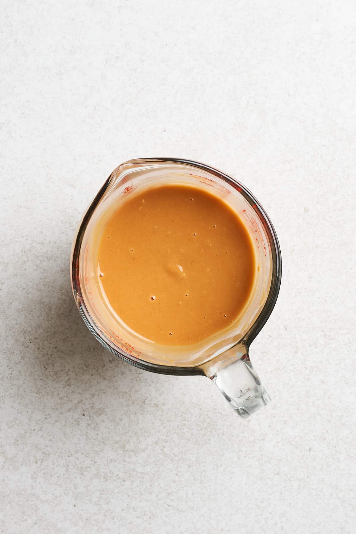 Creamy peanut sauce in a bowl.