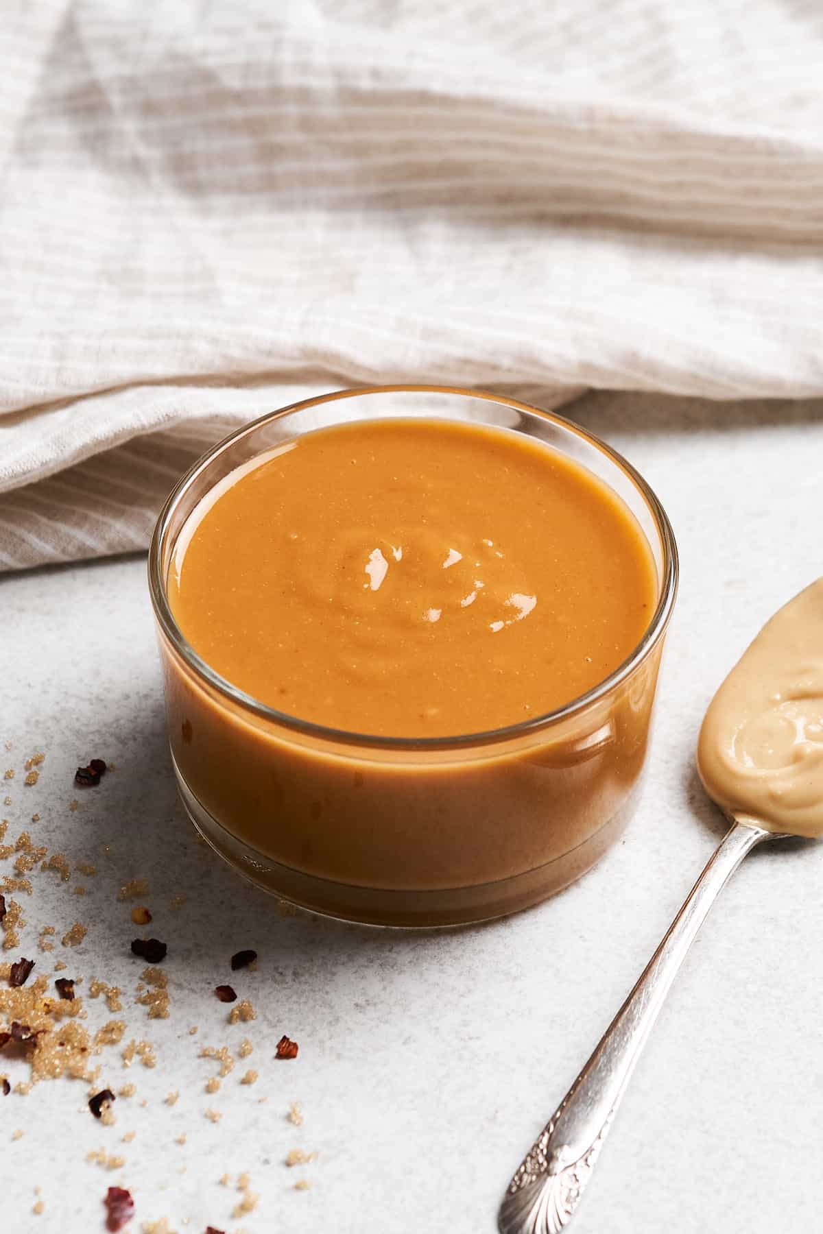 Peanut sauce in a mason jar.