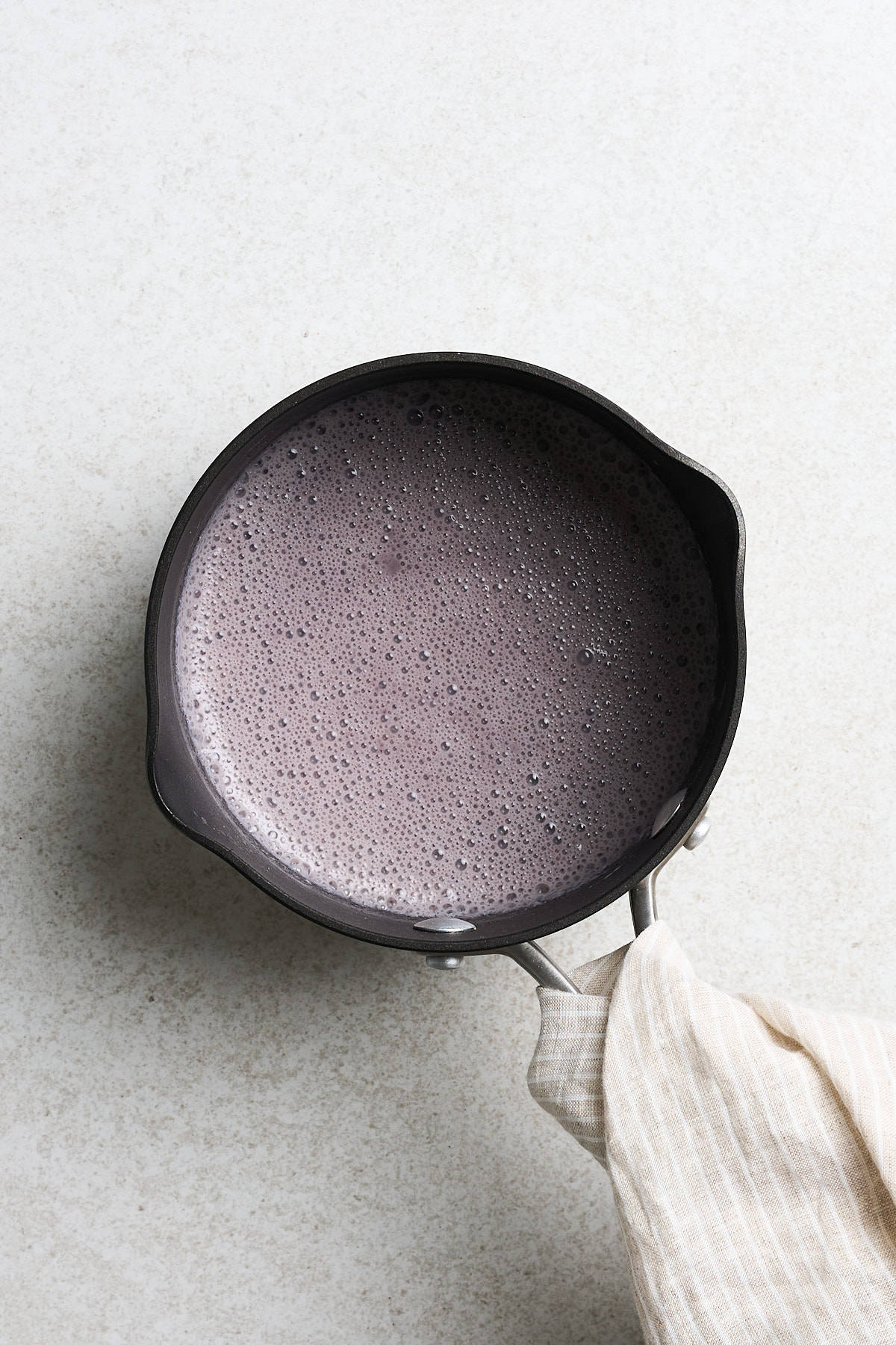 Hot mixture in a saucepan.