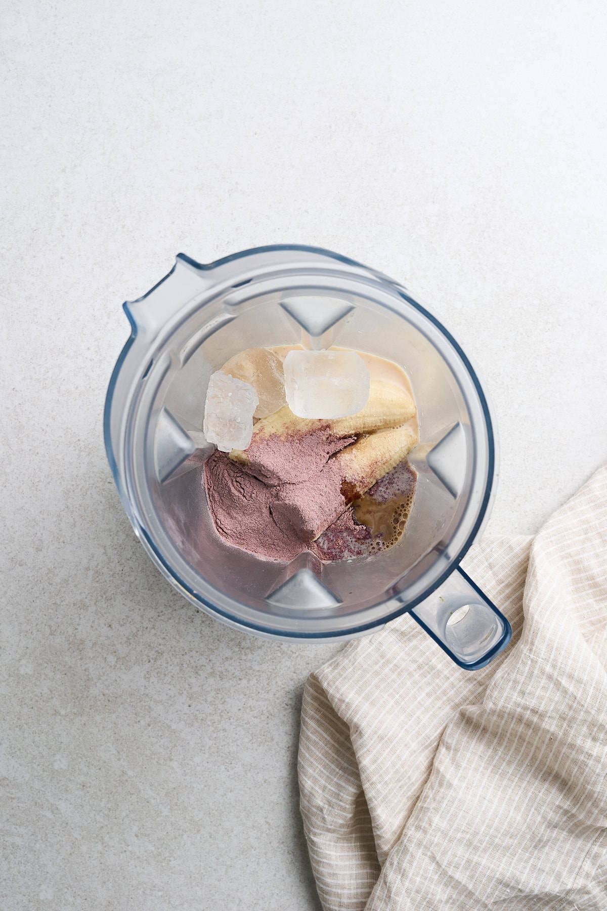 Plant milk, taro powder and other ingredients in a blender.