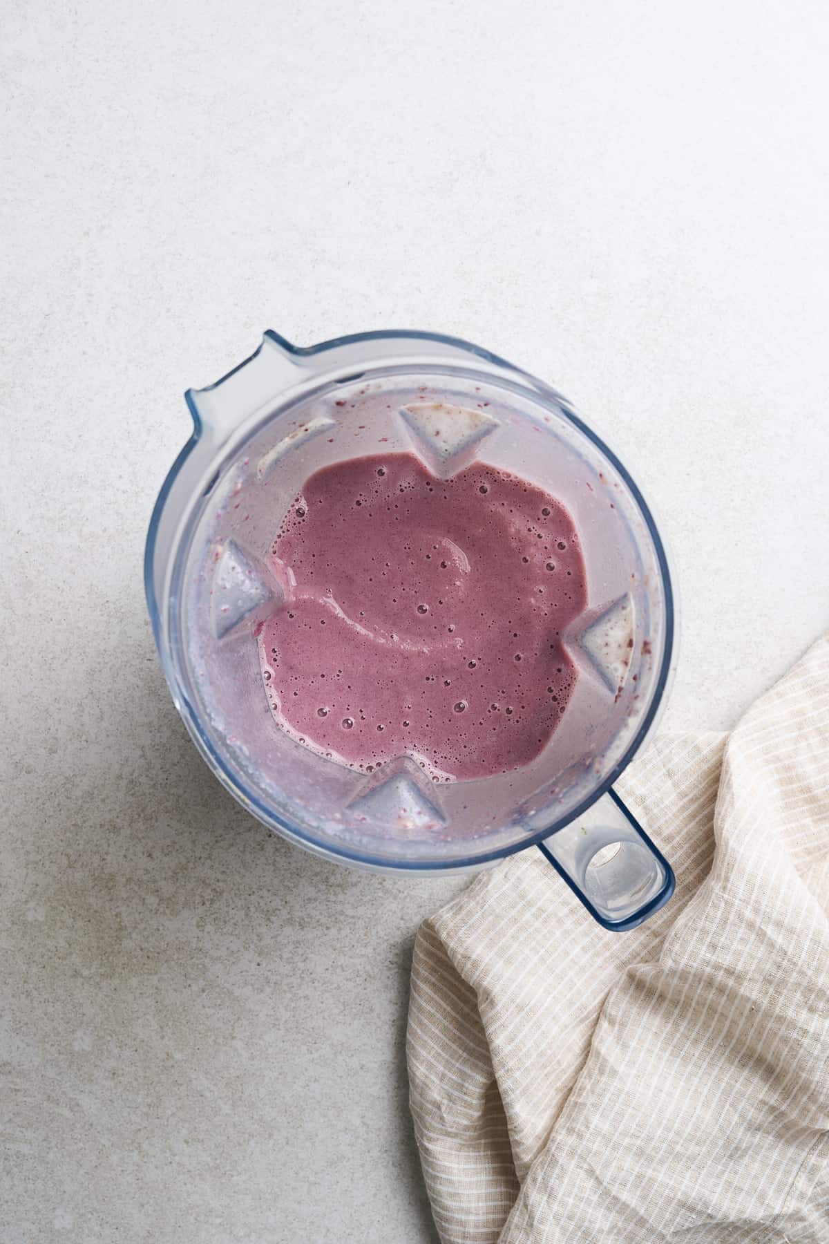 Creamy taro smoothie in a blender.