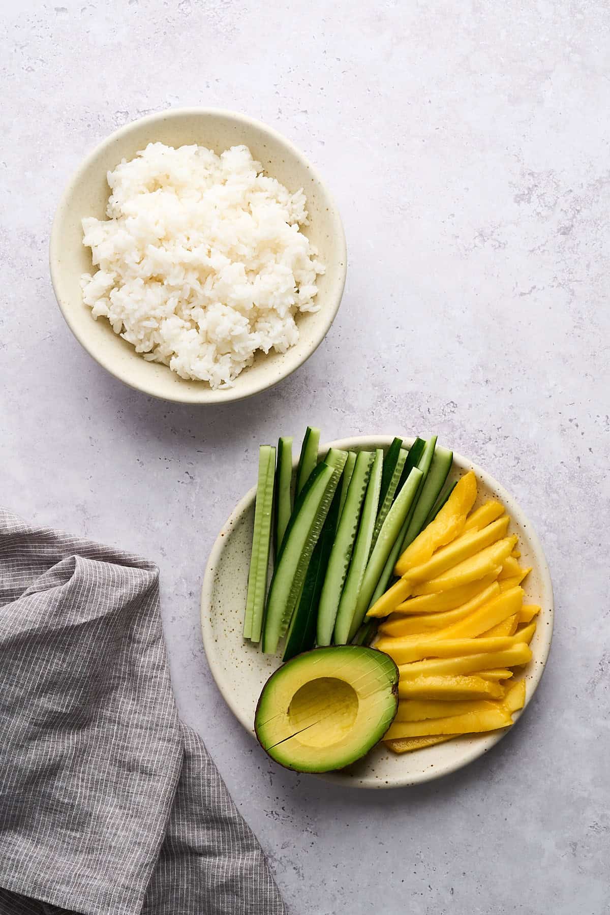 Sushi rice and chopped vegetables.